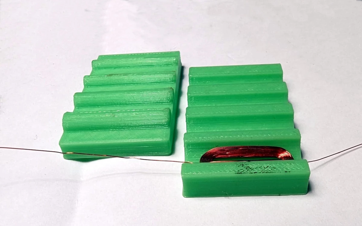 Bending galvanometer coils to match the stator bore diameter